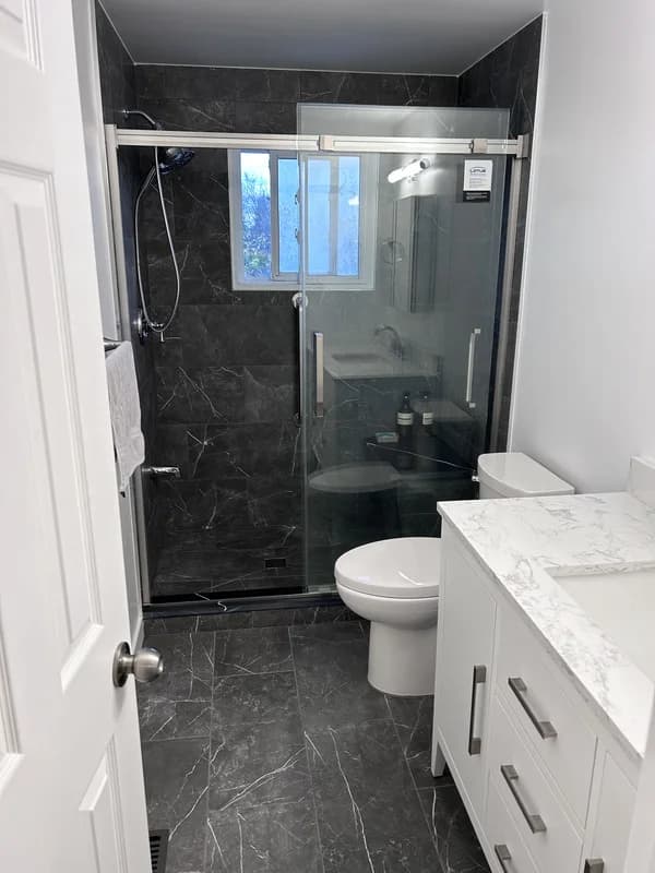 Accessible walk-in shower with bench and grab bars in London Ontario on Lacey Cr