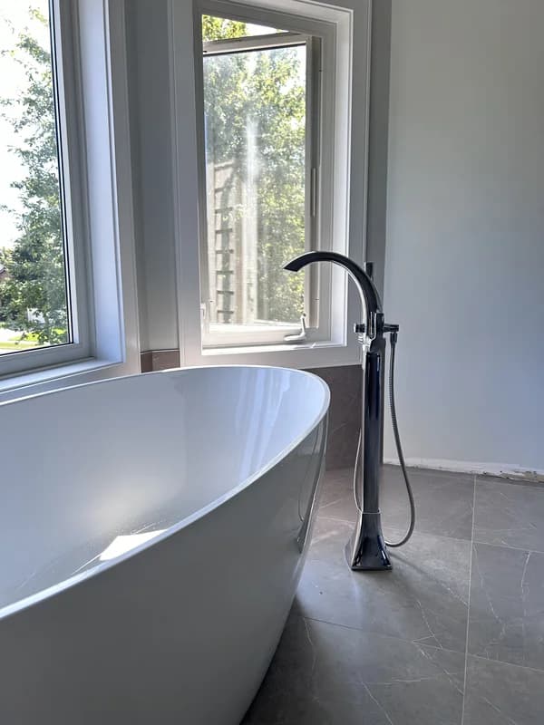 Master bathroom with freestanding tub, expanded shower, wide niche in London Ontario