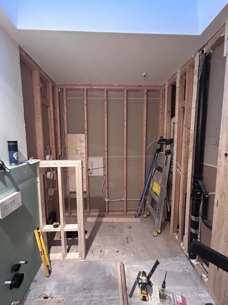 Master bathroom renovation London Ontario – large-format tile installation